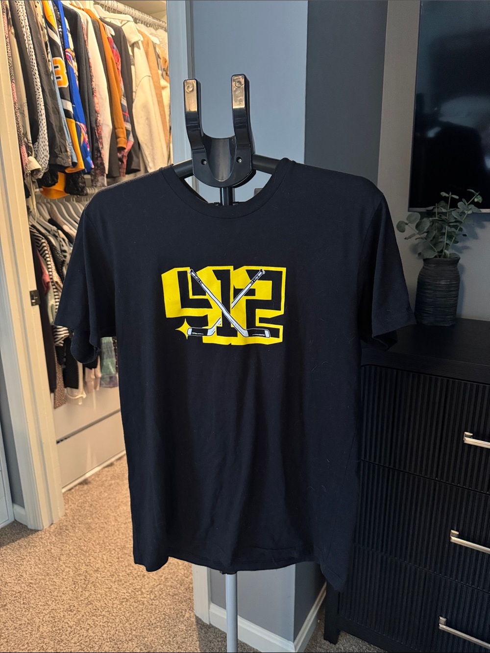 Men's Black Graphic Tee with Yellow Logo